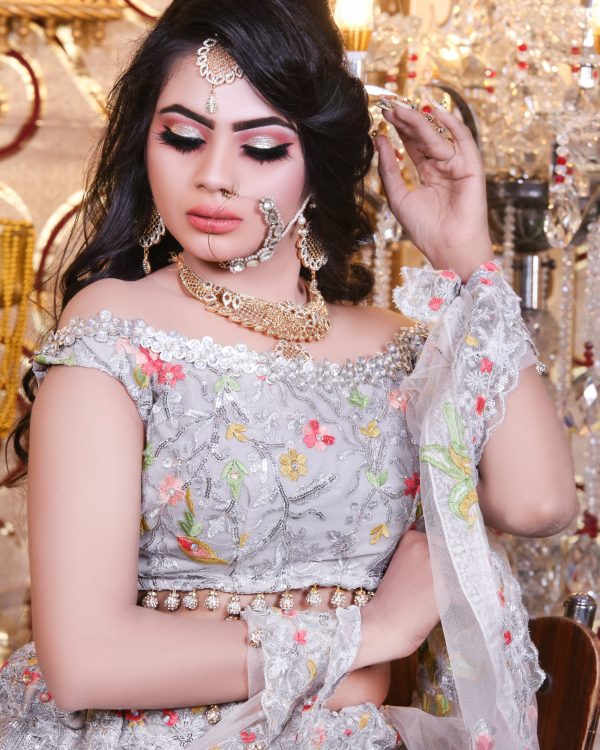 woman-grey-sari-with-silver-top-red-flower-front